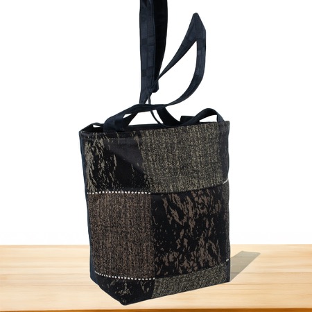 Czarna torba patchwork z kieszeniami